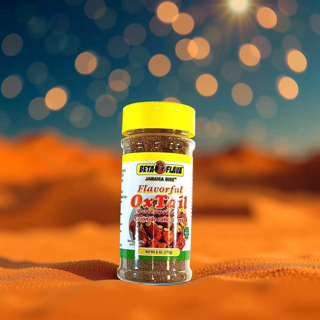 A 6 oz (170g) jar of TOJ EXPRESS BETA FLAVA Oxtail Seasonings, labeled with Jamaica Nice and Sazón de rabo de res. Packed with a flavorful blend of herbs and spices, it features an image of seasoned oxtail, ideal for enhancing your oxtail dishes.