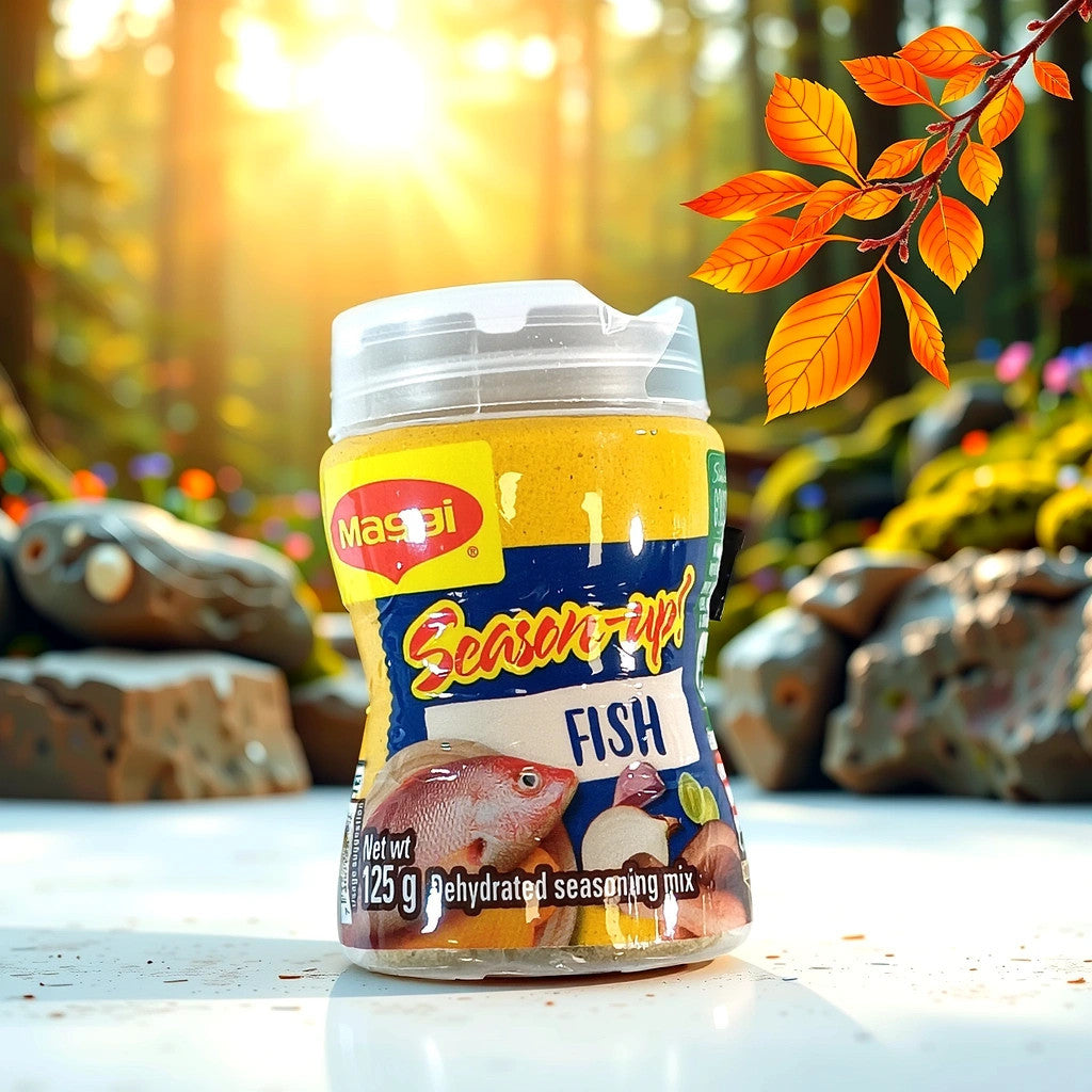 TOJ EXPRESS Maggie Fish Seasoning comes in a 125g bottle with a yellow cap and a blue label featuring fish, garlic, and onion images. Its perfect for enhancing seafood dishes with its dehydrated seasoning mix.