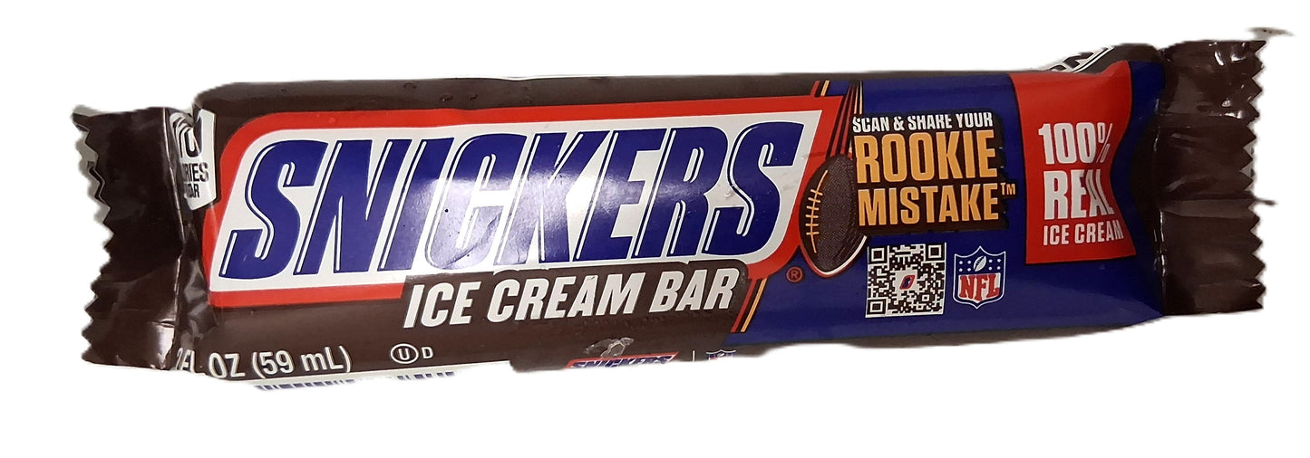 The TOJ EXPRESS Snickers Ice Cream Bar wrapper features its iconic logo, boasts 100% Real Ice Cream, and highlights NFL endorsements. It includes a splash of real milk chocolate and a QR code for the Rookie Mistake promotion.