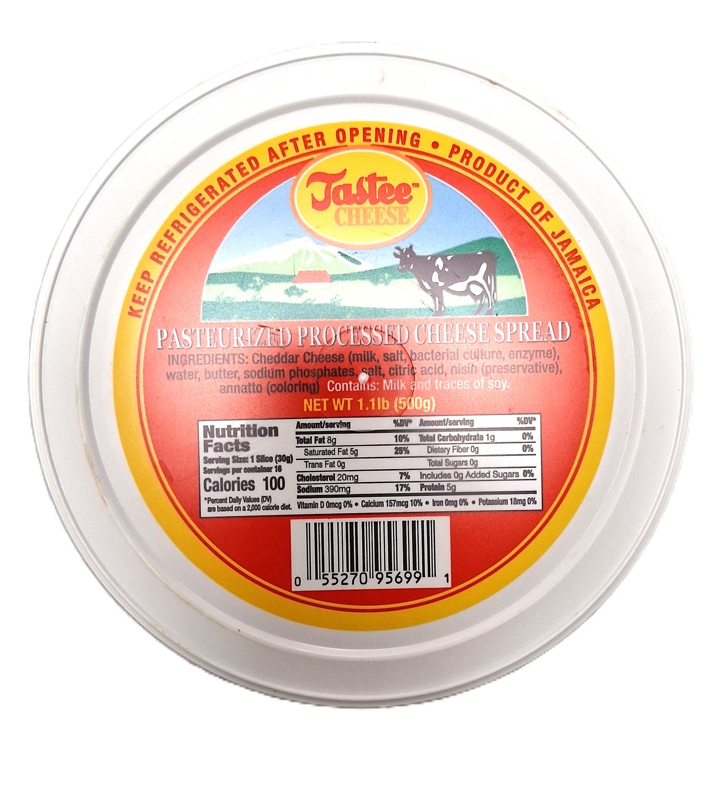 A round container of Tastee Cheese (1.1lb) by TOJ EXPRESS, with a red and yellow label depicting a cow, lists nutritional information and ingredients such as creamy cheddar cheese, milk, and salt. Net weight: 500g (1 lb 1 oz).