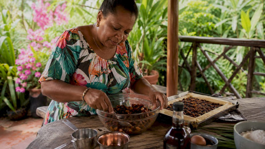 Woman preparing Caribbean dessert in kitchen