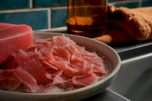 Pink carbolic soap shavings beside sink