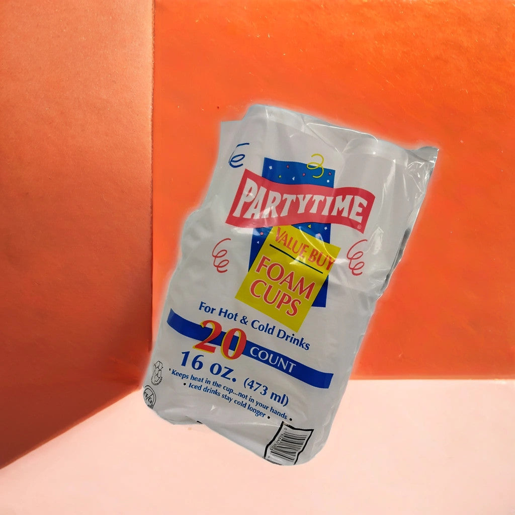 A package of PartyTime foam cups for hot and cold drinks, 16 oz., 20 count, is displayed against an orange and pink background.