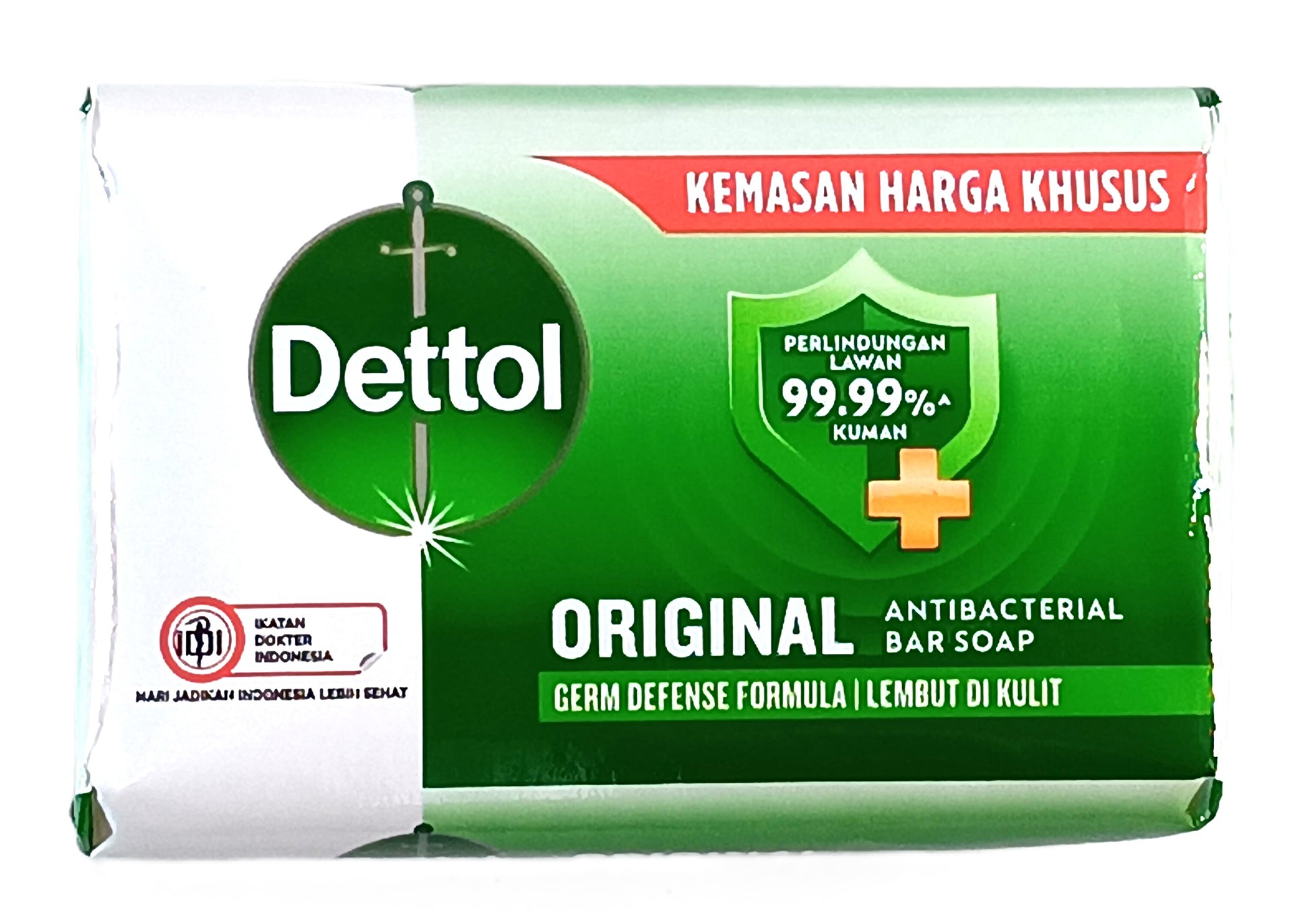 TOJ EXPRESSs Dettol Soap antibacterial bar highlights 99.99% germ protection with a green design and cross logo. Its gentle formula ensures excellent hygiene and comes in packaging with a special price label in Indonesian, perfect for those seeking effective cleanliness.