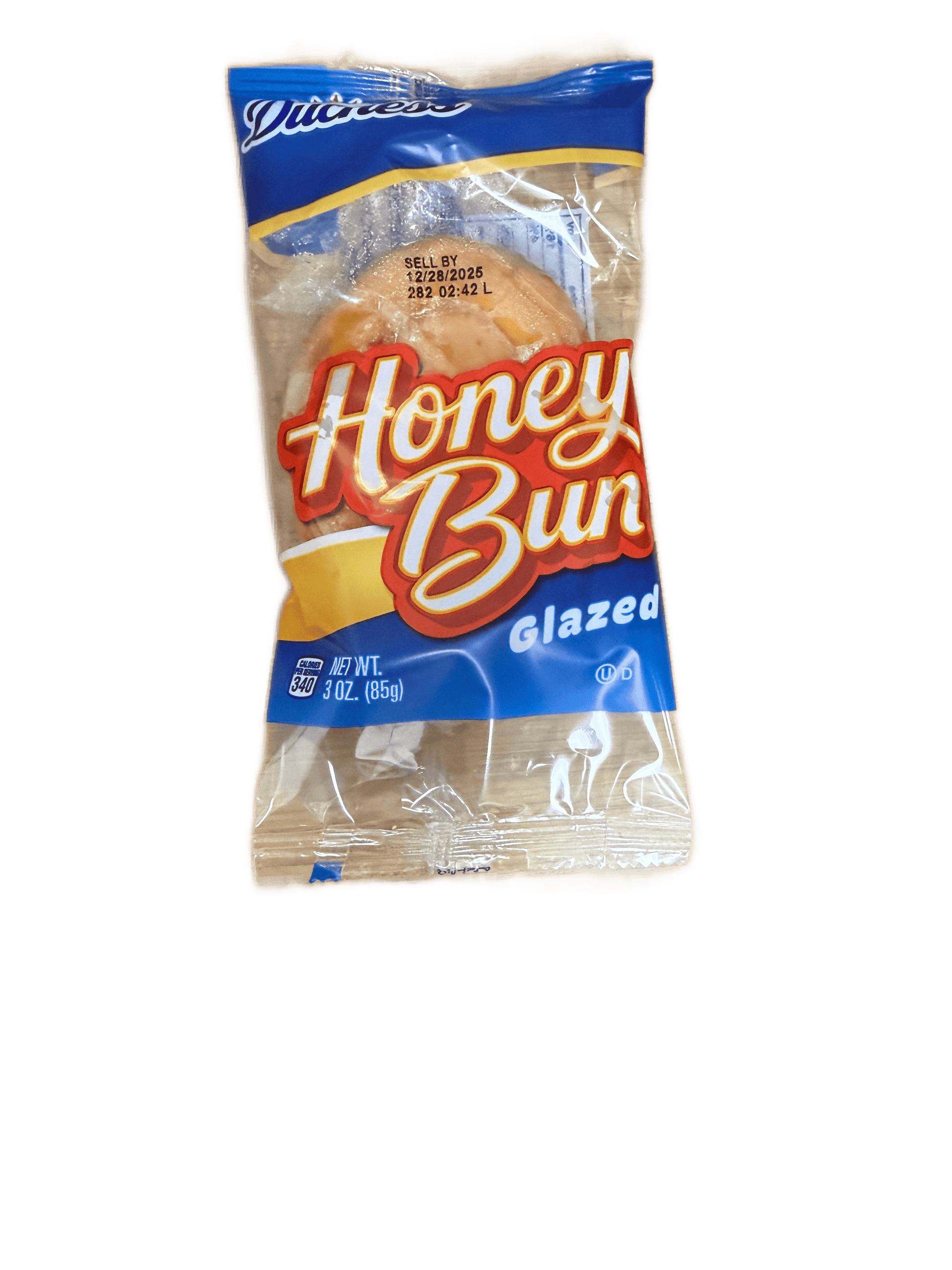 Packaged glazed honey bun with blue and yellow label on a transparent background