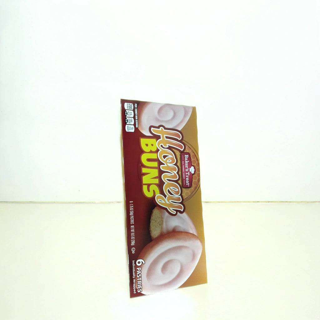 A box of TOJ EXPRESS Bakers Treat - Glazed Honey Bun (6pk), featuring bun images on the packaging, perfect for breakfast. The 6 pastries are displayed in a plain white background.