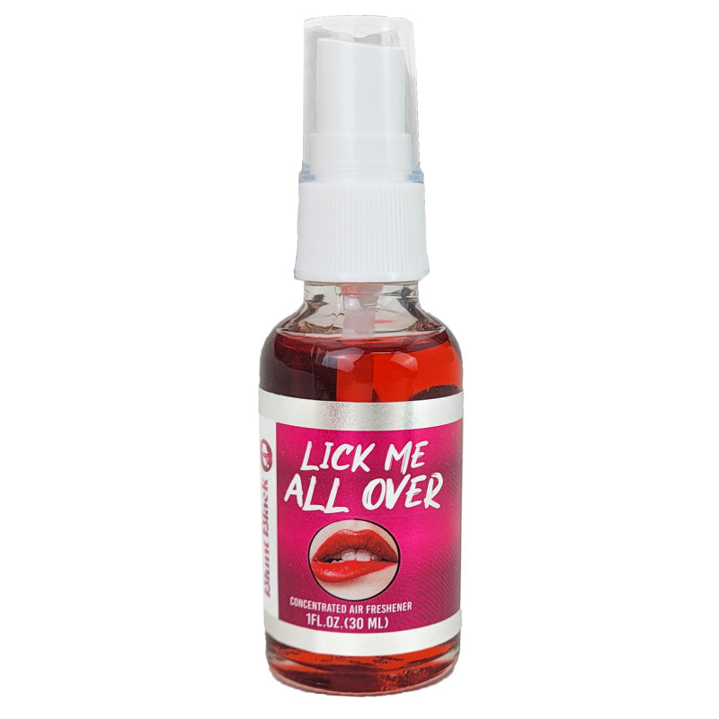 A compact 1 fl. oz. (30 mL) spray bottle of Blunt Black Air Freshener - Lick Me All Over by TOJ EXPRESS, featuring a pink label with an image of lips. This concentrated air freshener delivers a unique scent for lasting odor control in any space.