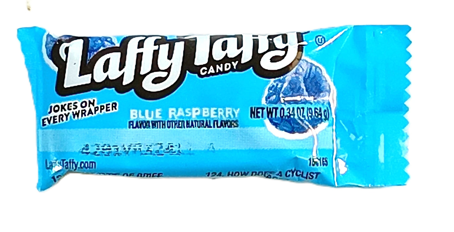 The blue wrapper of TOJ EXPRESSs Laffy Taffy (Blue Raspberry) candy presents the irresistible Blue Raspberry flavor, featuring jokes on every wrapper and a playful blue raspberry illustration. This delightful treat weighs 0.34 oz (9.6g).