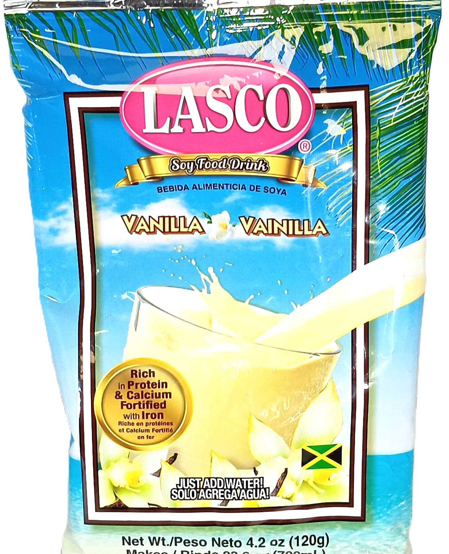 The LASCO Vanilla Drink package from TOJ EXPRESS features a glass of creamy vanilla drink with a splash design. Labels emphasize its protein, calcium, and iron content. A Jamaican flag is at the bottom right, with instructions available in Spanish and English.