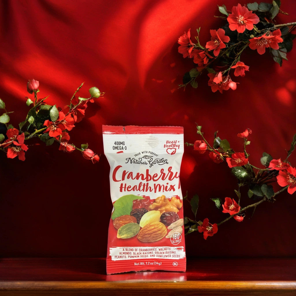Package of Nature's Garden Cranberry Health Mix on a red background with flowers.