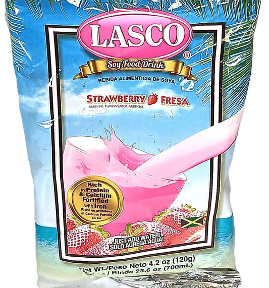 A packet of TOJ EXPRESS Lasco Strawberry Drink – Plant-Based, Soy-Infused; a ready-to-drink strawberry beverage with protein, calcium, iron, and a hint of pink. Features product details and a small Jamaican flag on the label.
