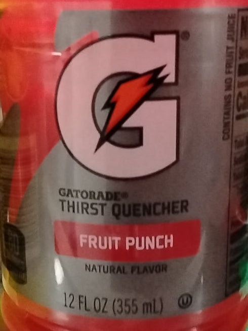 Close-up of a TOJ EXPRESS Gatorade 12 oz Fruit Punch bottle label, showing the bold G logo with lightning bolt, flavor name, and size (12 FL OZ/355 mL) for powerful electrolyte replenishment.