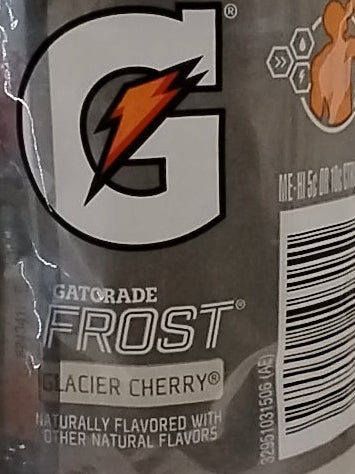 Close-up of a TOJ EXPRESS Gatorade Glacier Cherry (12 OZ) bottle label, featuring a bold G logo with an orange lightning bolt to emphasize hydration and electrolyte replacement; barcode appears on the right.