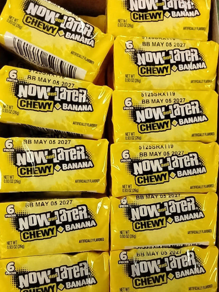 Close-up of several TOJ EXPRESS Now & Later Banana chewy candy packages arranged in rows, each wrapper showing the brand and banana flavor, highlighting this long-lasting treat.